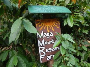 Maya Mountain Research Farm sign