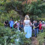 Jude Fanton taking the tour of the Seed Savers gardens in Byron Bay